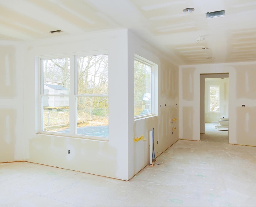 Interior construction of housing project highlighting Nest's painting and drywall services