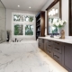 Master Modern Bathroom Interior In Luxury Home With Dark Hardwoo Key Considerations for Successful Retail Construction